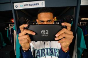 Nintendo of America teams up with the Seattle Mariners again for the 2026 season, players are shown playing Nintendo Switch 2 and their jerseys have the Nintendo logo on them